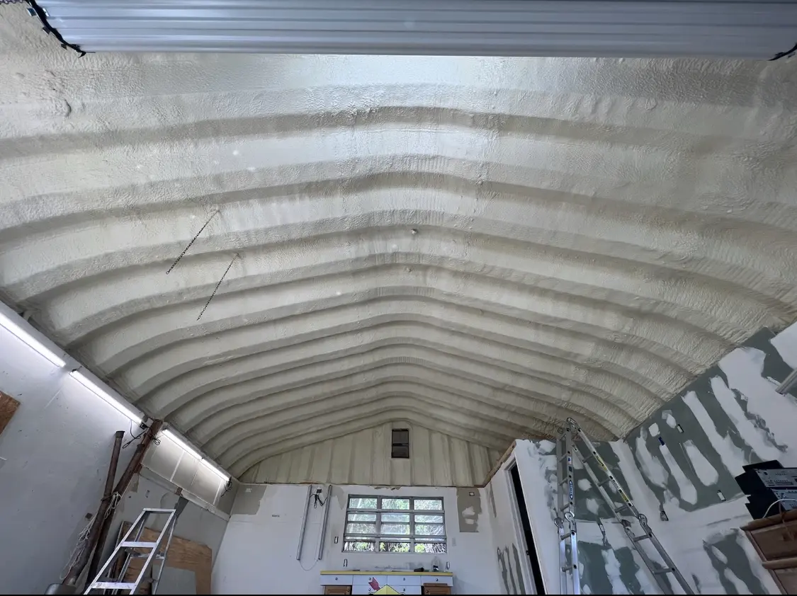 Spray polyurethane foam applied to the underside of a metal roof deck in Eatontown